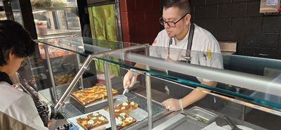 Super Bowl 60 wing feast prepared by Chef Lynne's team
